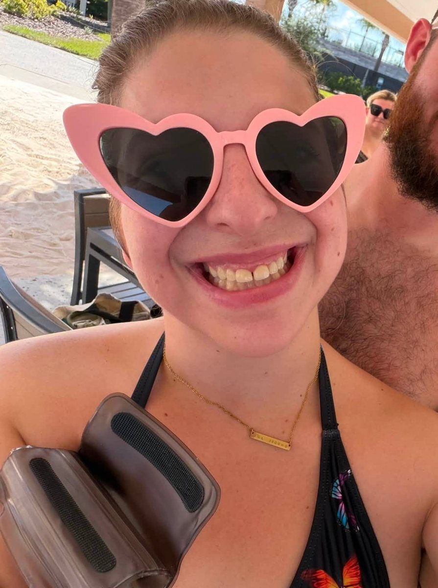 Samantha in heart-shaped sunglasses