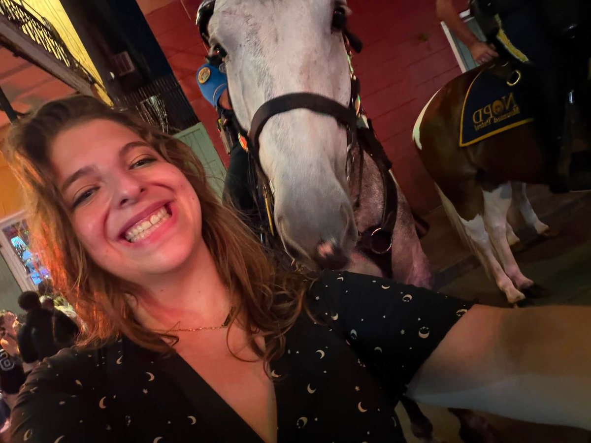 Samantha making friends with a horse in New Orleans